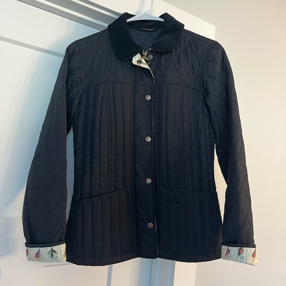 Barbour quilted coat with fly fishing pattern